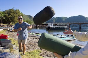 Guide Charo handing out Sea Kayak Adventure gear
